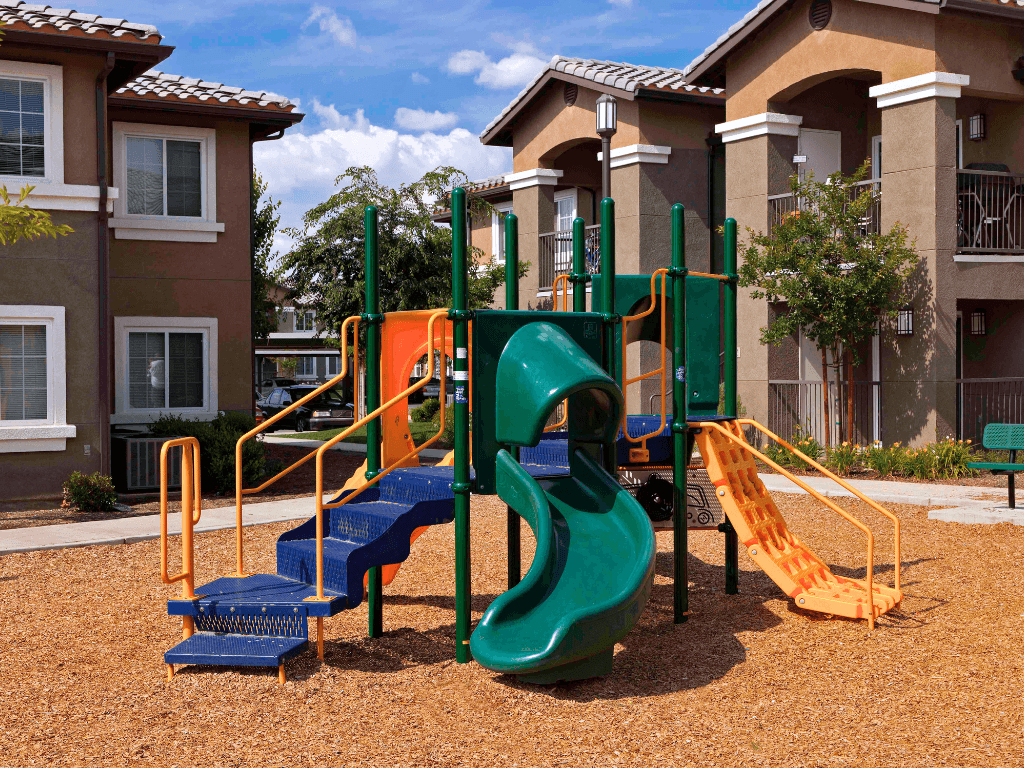 Playground at Harvard Court Affordable Apartments in Lindsay, CA