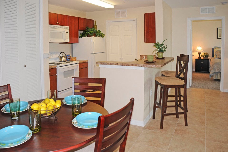 Kitchen and Dining Area at Hudson Ridge Apartments in Port Richey, FL