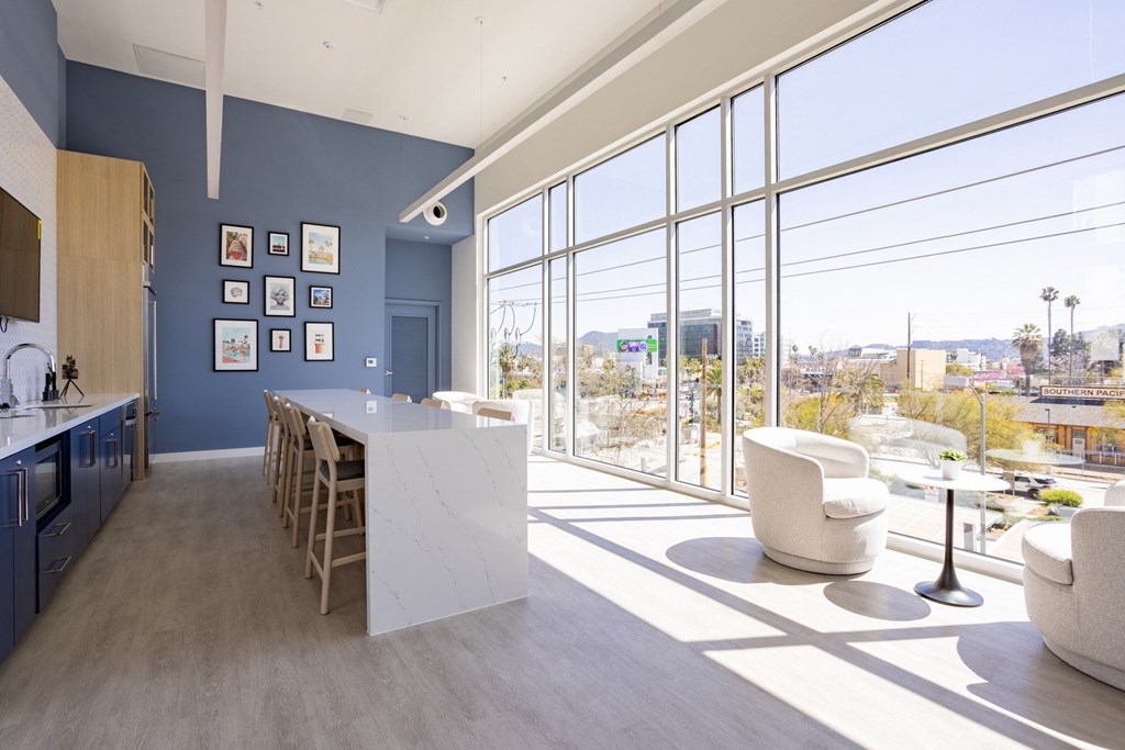 Expansive resident lounge overlooking the pool deck at The Chandler in North Hollywood