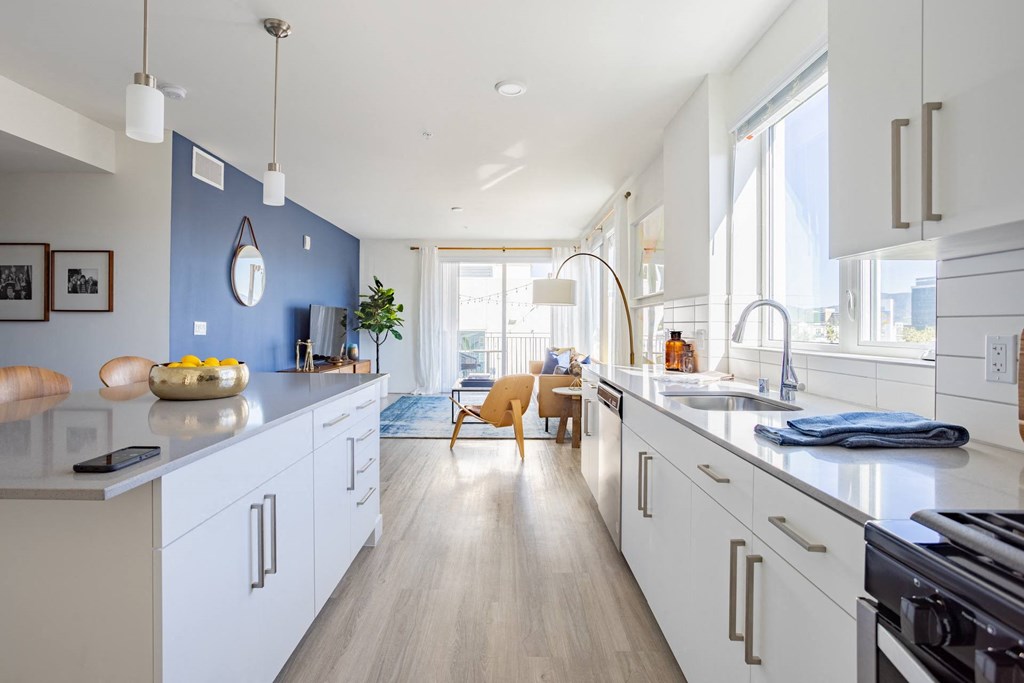 Large kitchen with designer finishes at The Chandler Apartments in North Hollywood