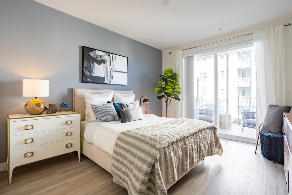 Bedroom with a private balcony access at The Chandler in North Hollywood