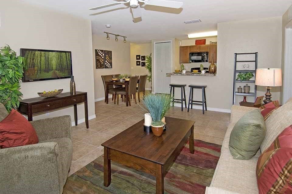 a living room with a couch and a table