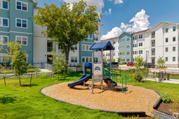 Playground at La Cima Apartments in Austin TX - Photo Gallery 8