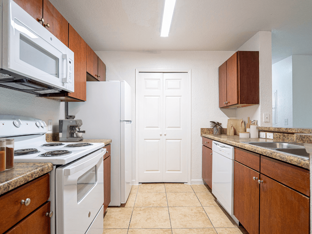 Chef Style Kitchen with Bar Seating at Timber Trace Apartments