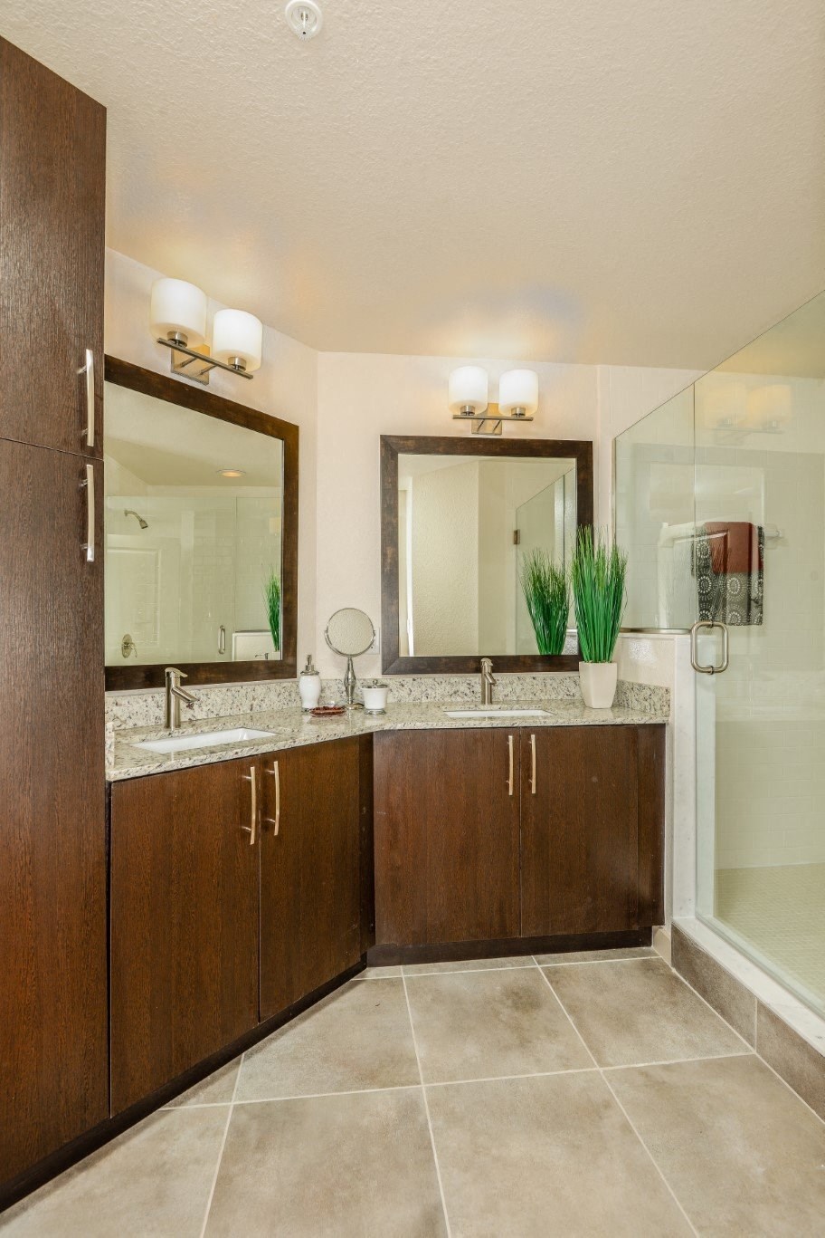 Bathroom with double sinks at Palm Ranch Apartments in Davie, FL