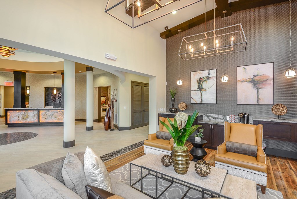 Relaxing resident lounge area in the clubhouse at Palm Ranch Apartments in Davie, FL
