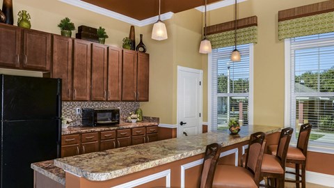 a kitchen with a granite counter top