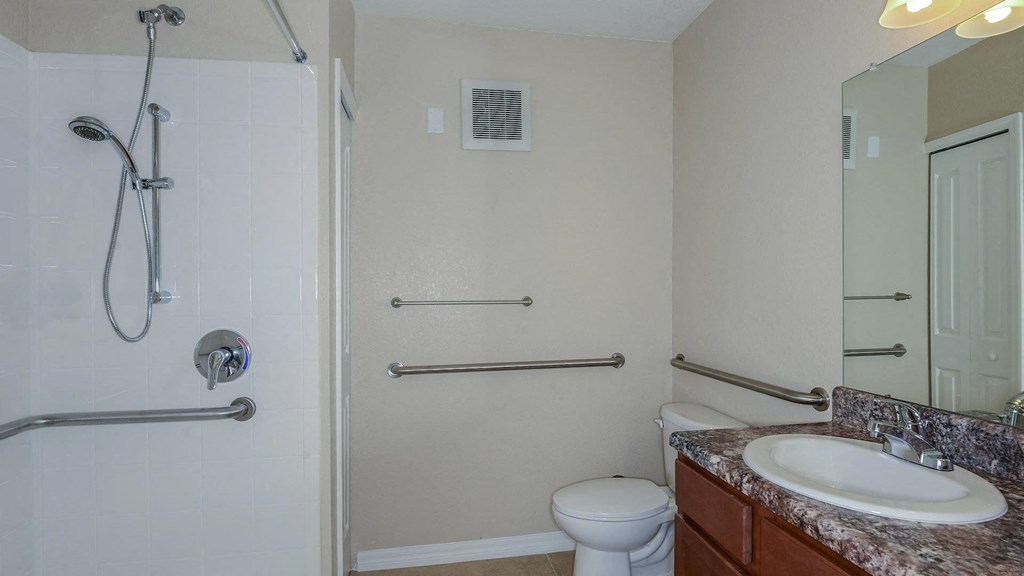 Bathrooms with Grab Bars at Santos Isle Senior Apartments in Tarpon Springs FL