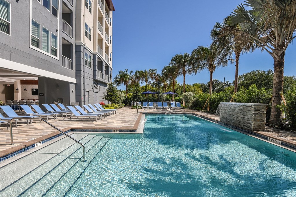 Sun sparkling swimming pool at The Exchange Luxury Apartments in St. Petersburg, FL