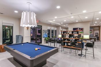 Game Lounge with Billiards at The Exchange Luxury Apartments in St. Petersburg, FL