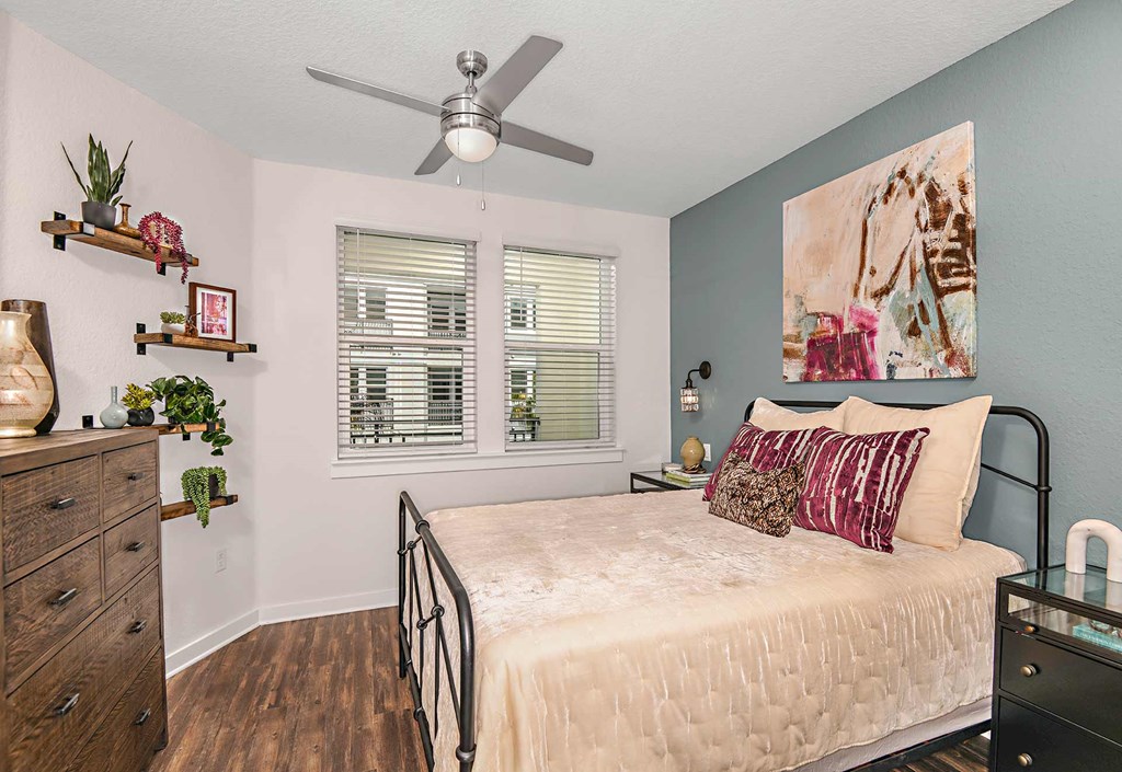 Bedroom with ceiling fan at The Foundry Luxury Apartments in Tampa FL