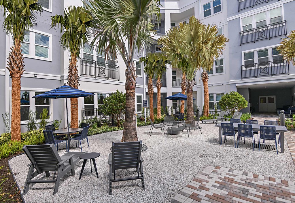 Garden Courtyard and BBQ Grill Area at The Foundry Luxury Apartments in Tampa FL