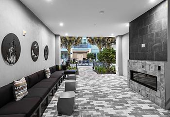 Covered Veranda with Lounge Seating at The Foundry at NoHo, Tampa, FL