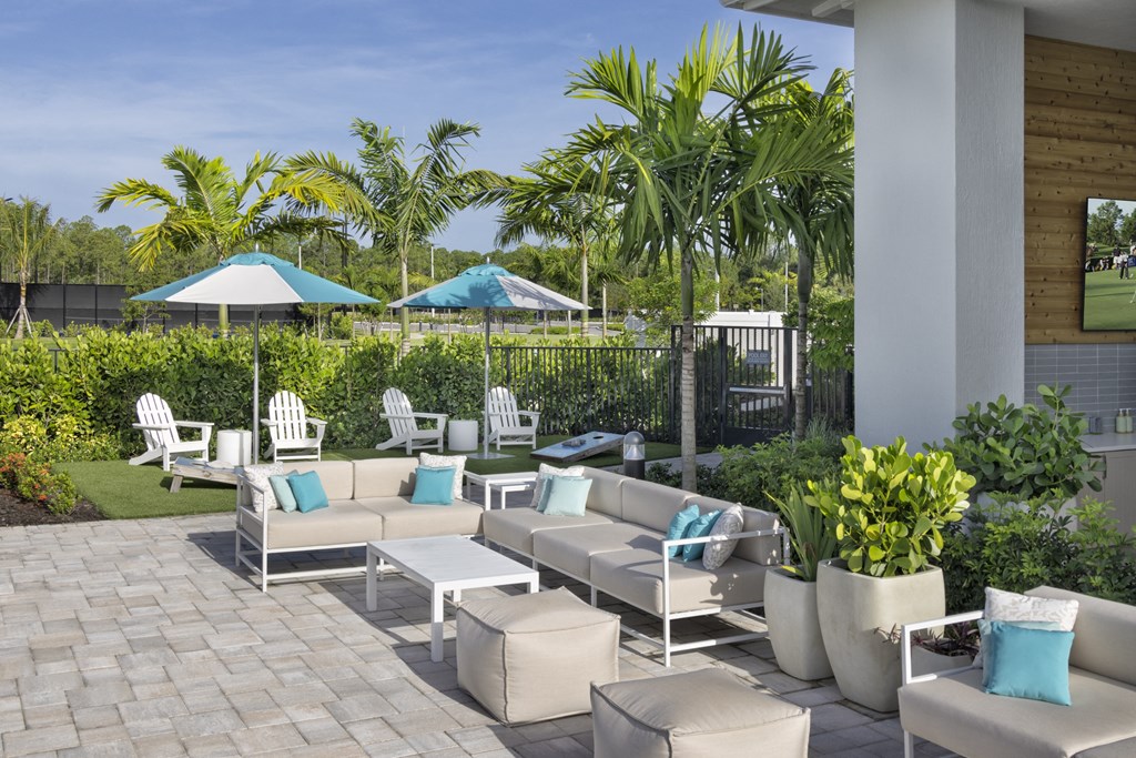 Poolside Patio at Everly Apartments in Naples, FL