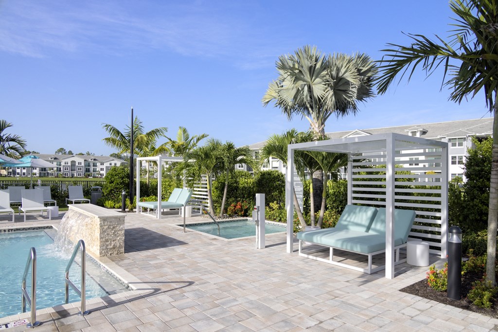 Pool Deck with Heated Spa at Everly Apartments in Naples, FL