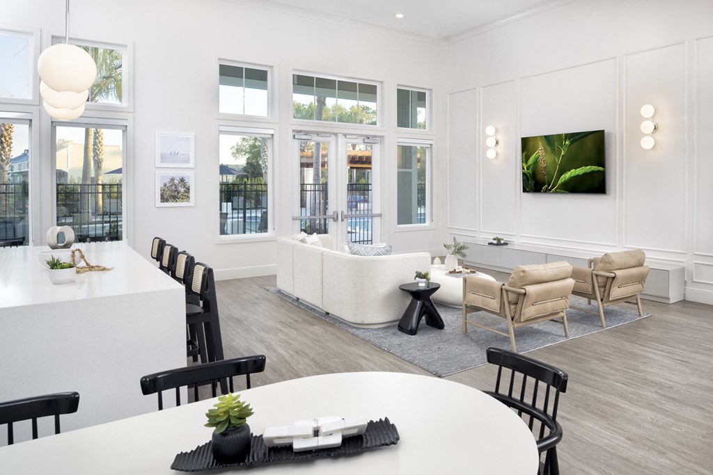 Club Room with Lounge Seating at Jackson Palms Affordable Apartments in Jacksonville FL