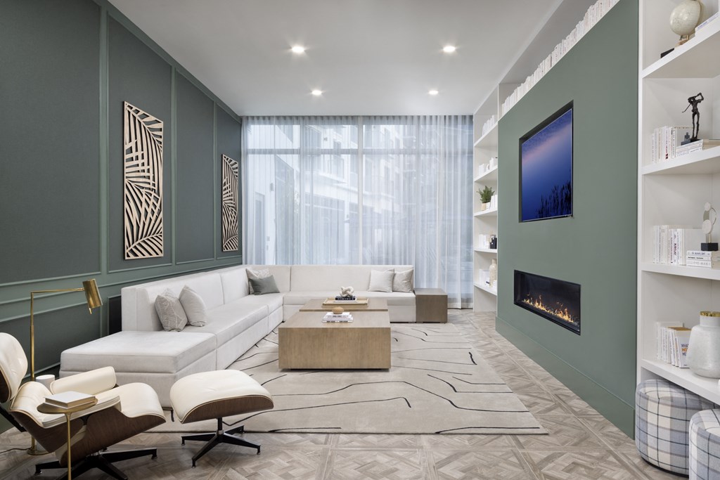 Library with Fireplace at The Marc Luxury Apartments in Palm Beach Gardens FL