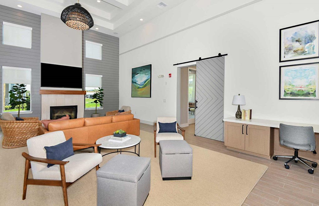 Library with Fireplace and Computer Stations at The Gallery Luxury Apartments in Trinity, FL