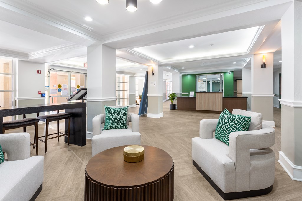 Club Room with Lounge Seating at Grand Plaza Senior Apartments in Los Angeles, CA