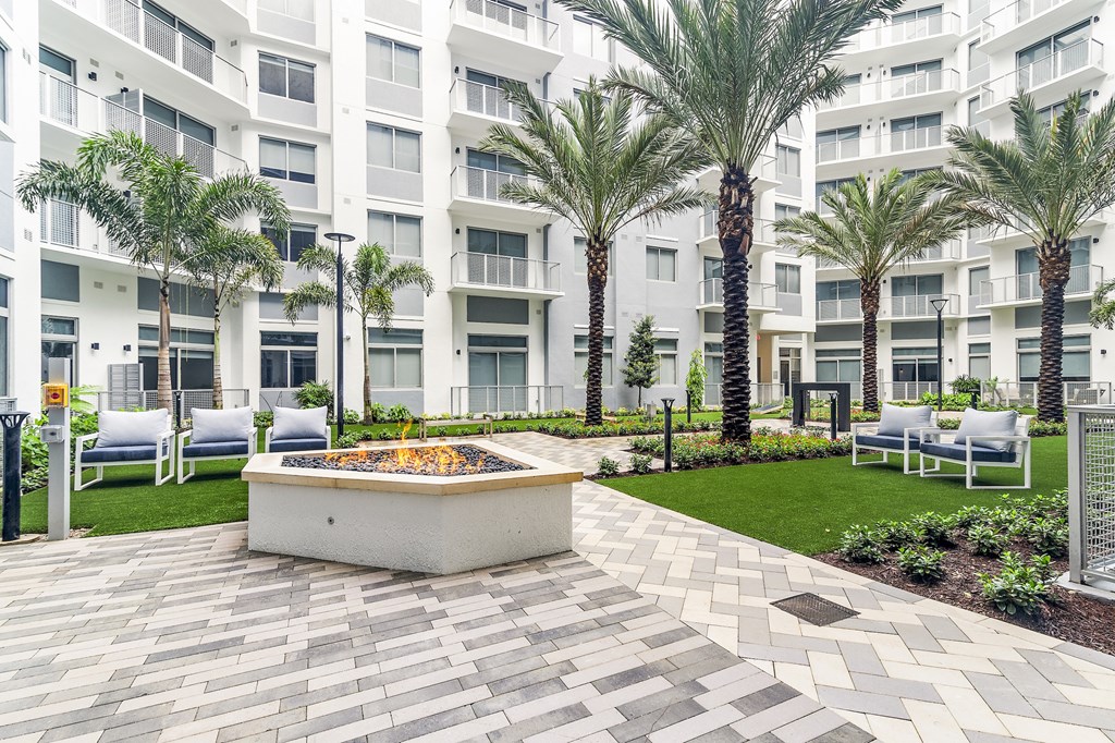 Courtyard with Fire Pits at The Marc Luxury Apartments in Palm Beach Gardens FL