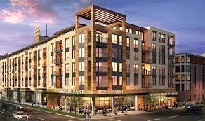 a rendering of a large building on a city street