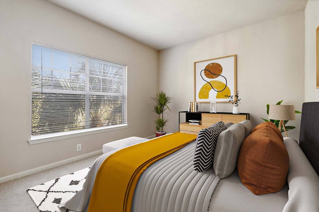 a bedroom with a bed and a window at Grandeville on Saxon, Orange City, FL