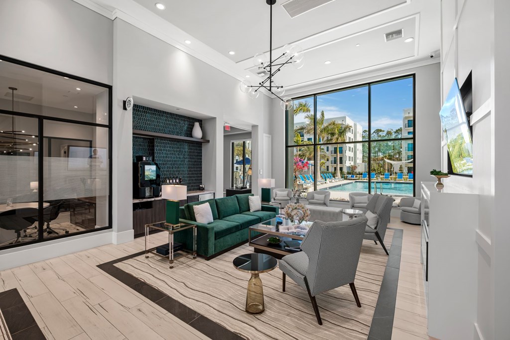 Lobby and sitting area overlooking the pool within the Clubhouse