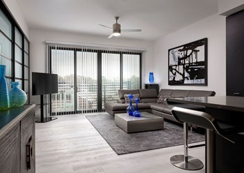 Living room with private balcony | SLX Atlanta - Photo Gallery 7