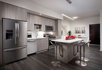 Kitchen with stainless steel appliances | SLX Atlanta - Photo Gallery 6