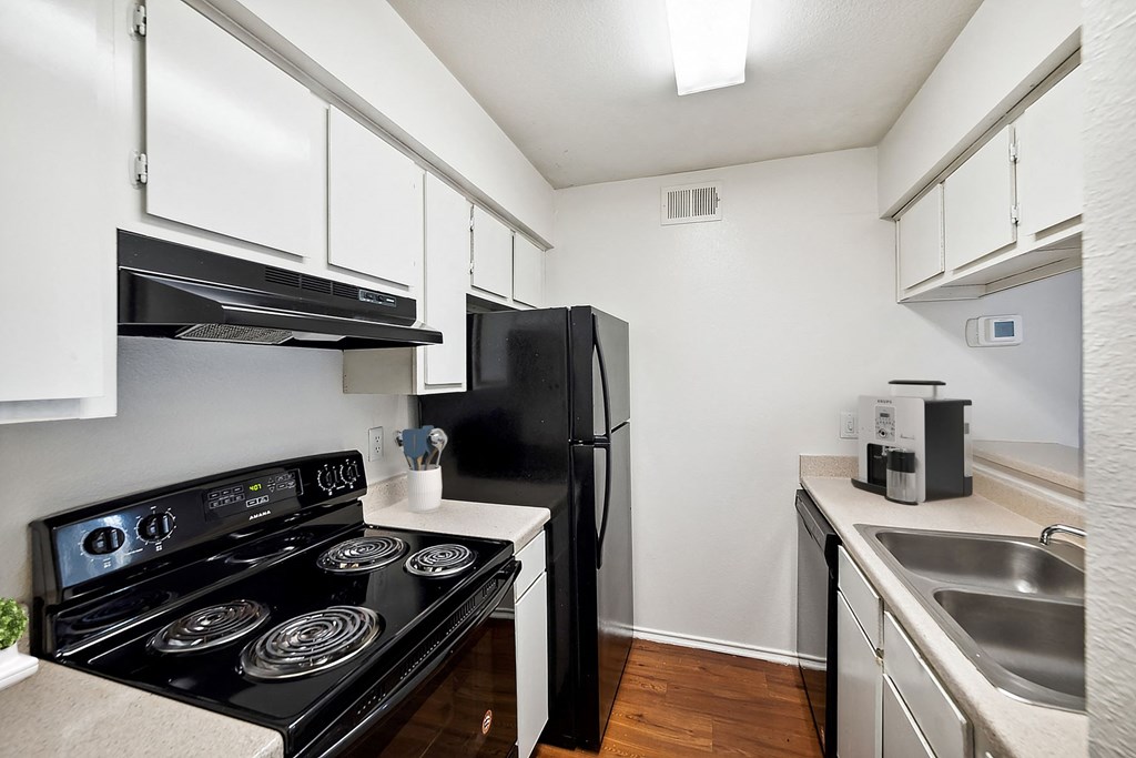 Kitchen with Black Appliance Kitchen with Black Appliance at Great Hills, Austin, TX