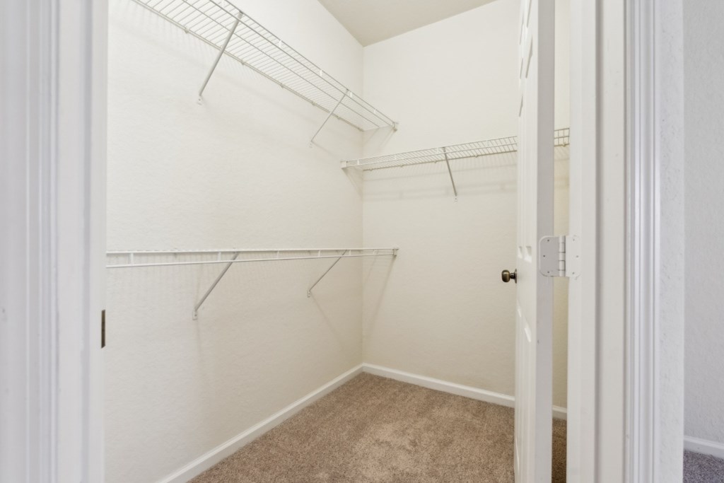 A spacious walk-in closet at the Ballantrae apartments in Florida