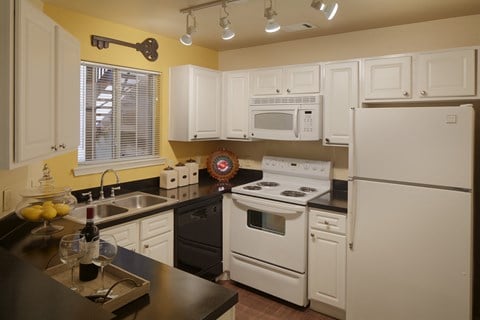 Apartment kitchen with built-in microwave | Austin TX