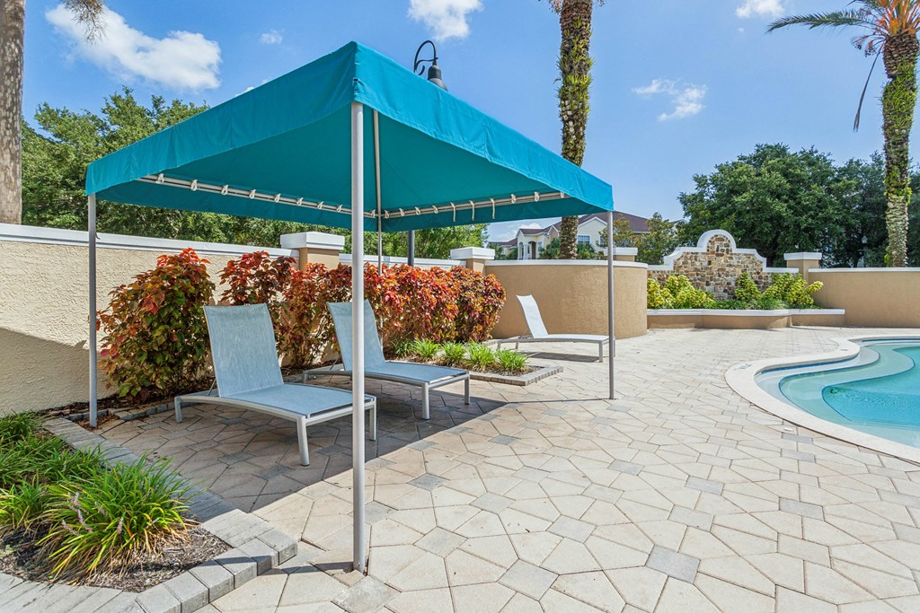 patio with lounge seating at Grandeville on Saxon, Orange City