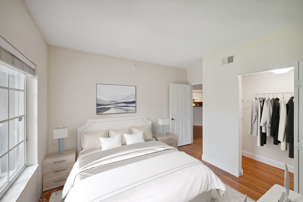 Bedroom with a large bed and a closet at Via Lugano, Boynton Beach, 33436