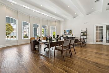 Community business center with computers, desks, and wifi