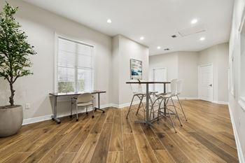 Community business center with computers, desks, and wifi