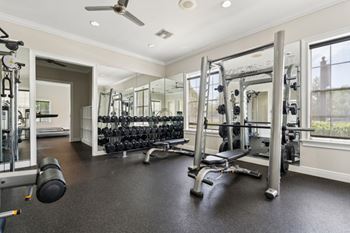 a gym with treadmills and exercise bikes  at Ballantrae Apartments, Sanford, FL