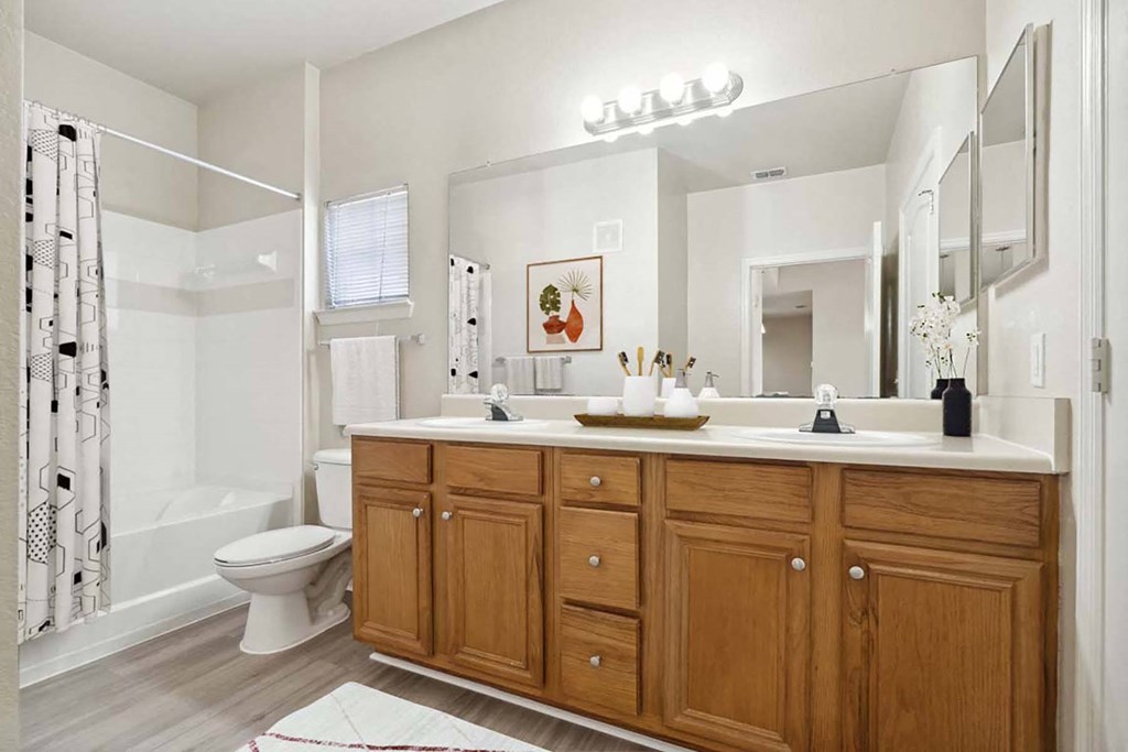 a bathroom with a sink and a toilet at Grandeville on Saxon, Orange City