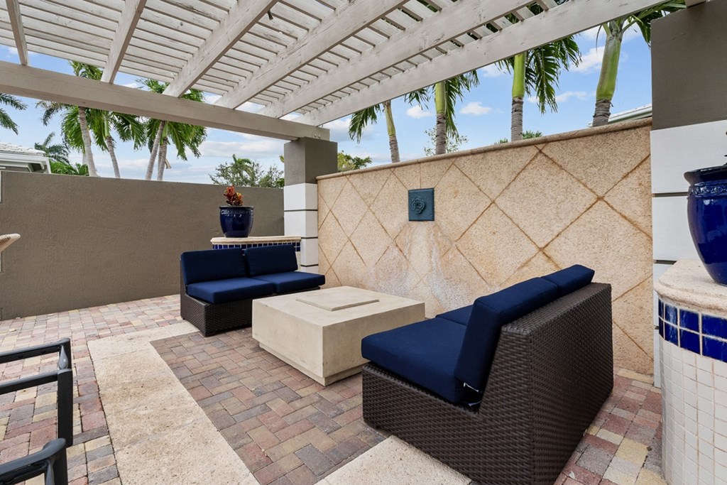 Poolside Seatin at Promenade at Reflection Lakes, Florida, 33907