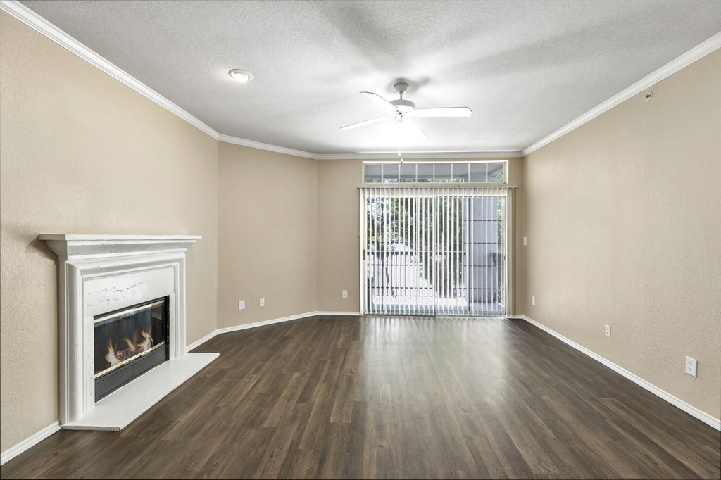 Living Room with Fireplace at River Stone Ranch, Austin, TX