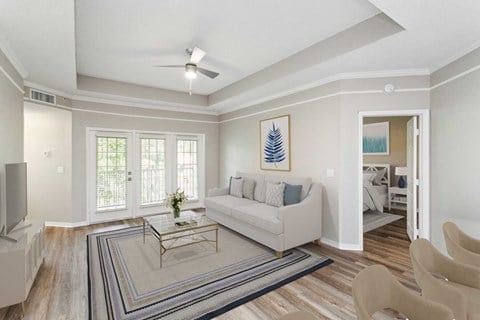 a living room with a couch and a coffee table  at Ashlar, Fort Myers, FL, 33907