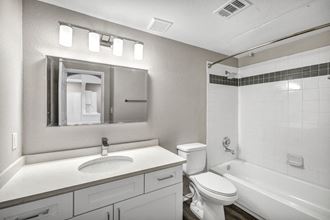 a bathroom with a sink toilet and bathtub - Photo Gallery 5
