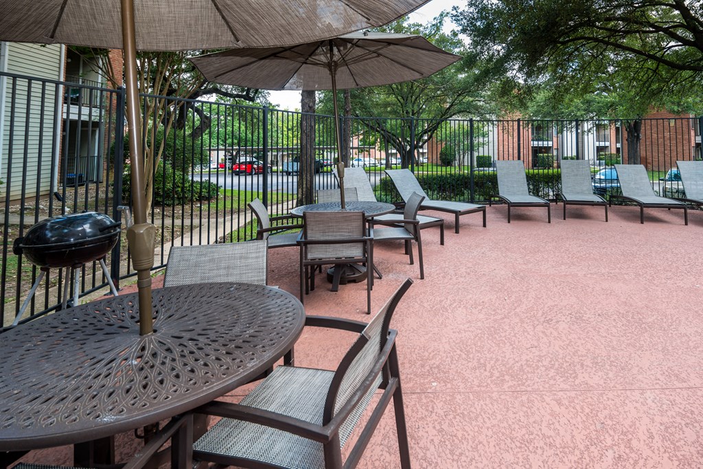 Poolside lounge area Poolside lounge area at Village Oaks Apartments, Austin, TX, 78759