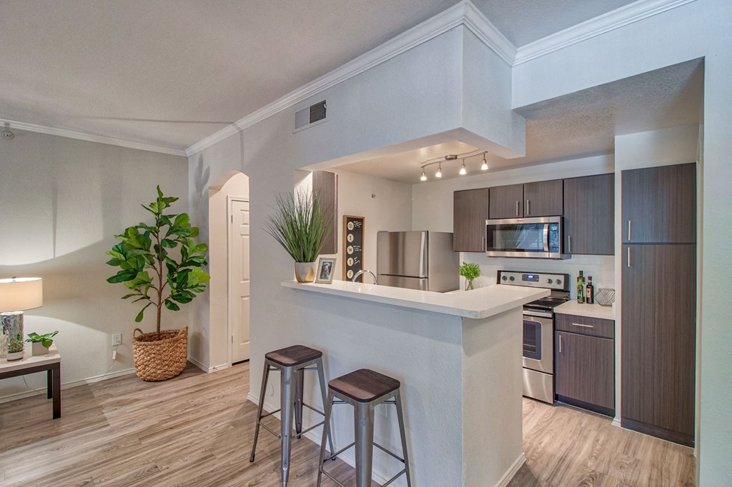 Kitchen Kitchen with Quartz Countertops at Stonelake at the Arboretum, Texas, 78759