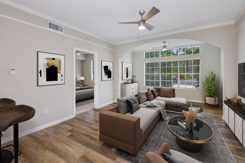 Living room with wood style flooring at Ashlar, Fort Myers