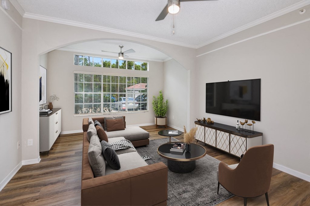 Living room with ceiling fan at Ashlar, Fort Myers, FL, 33907