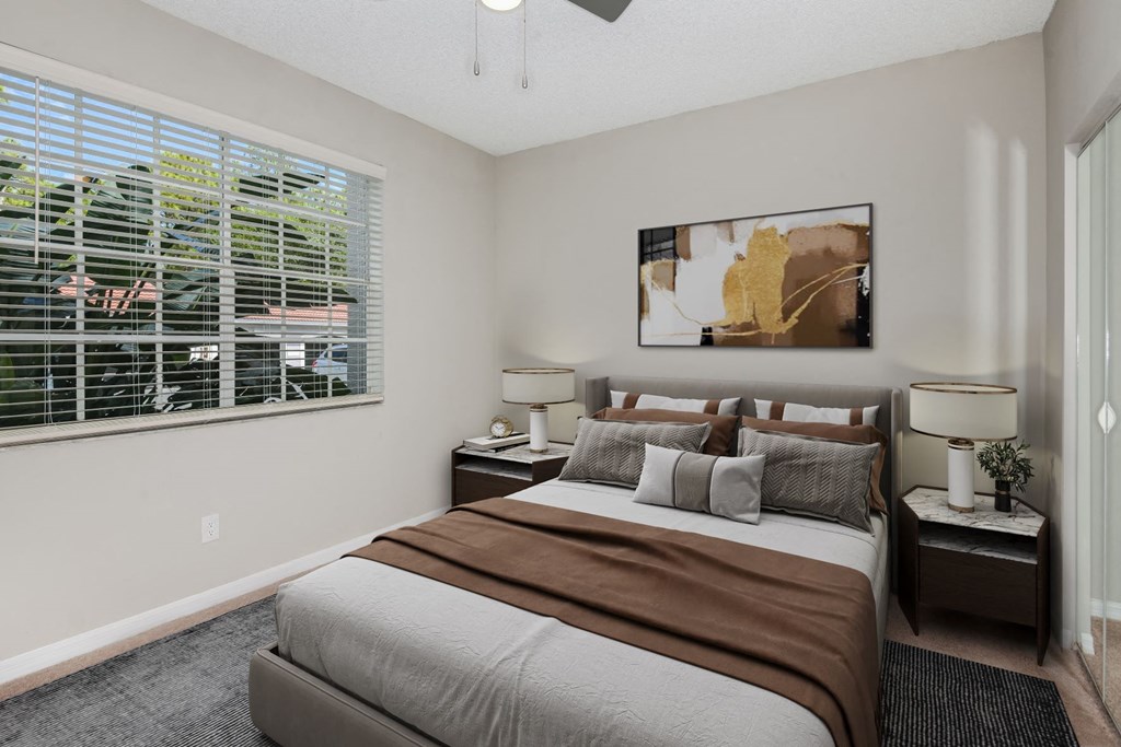 Bedroom with ceiling fan at Ashlar, Fort Myers, Florida