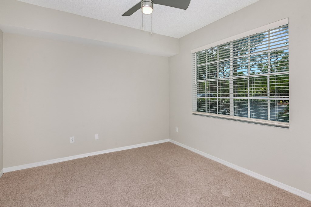 Bedroom with plush carpeting at Ashlar, Fort Myers