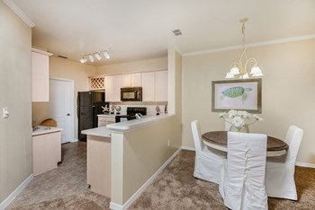 Kitchen and dining room Kitchen and dining room | Bay Breeze Villas - Photo Gallery 3