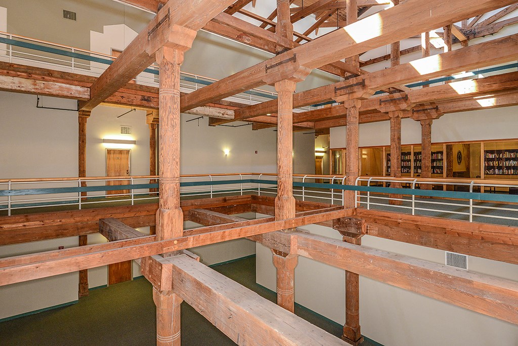 Exposed beams and brick wall accents at Bigelow Commons, Enfield